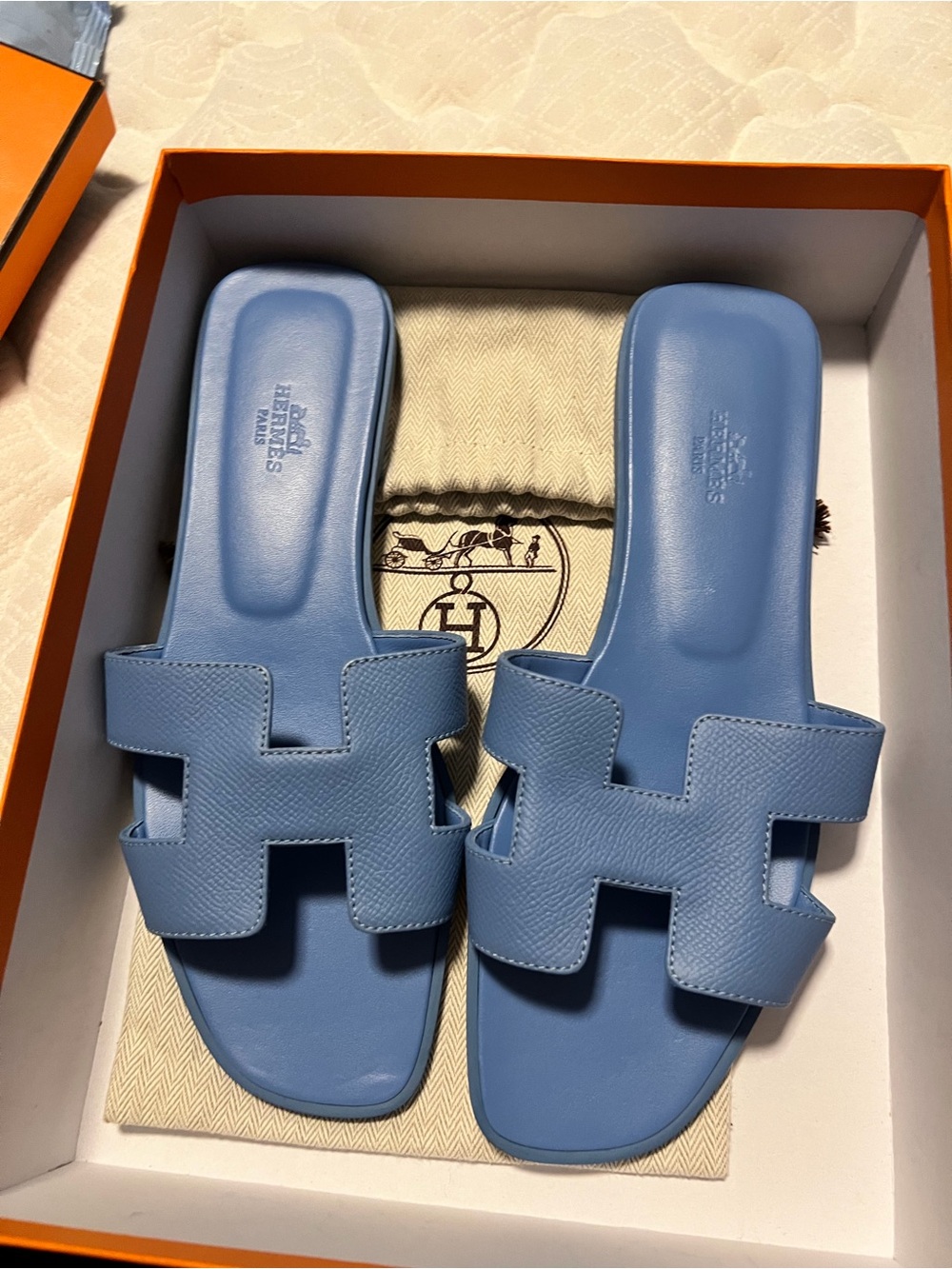 Hermès light blue Oran leather slide sandals